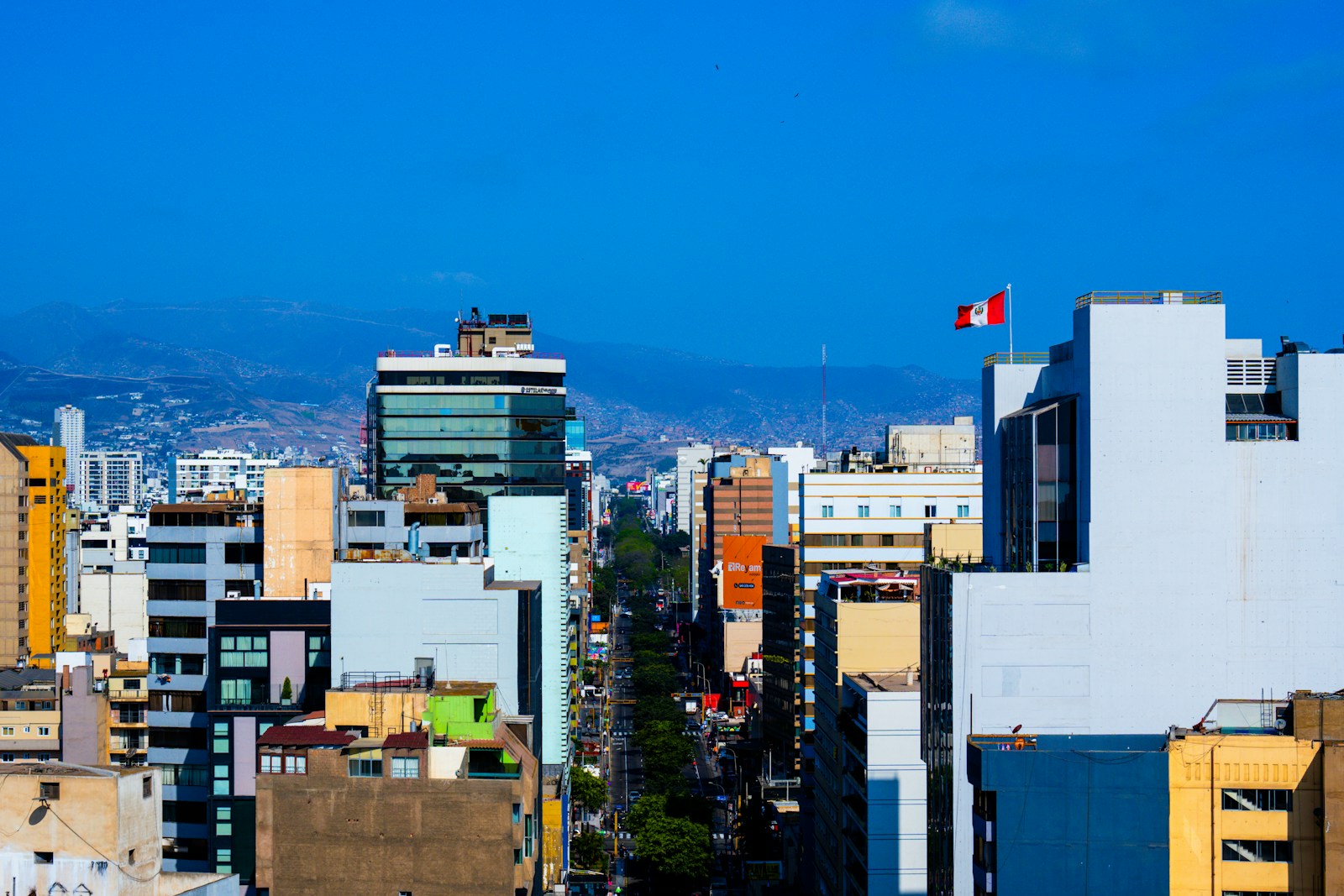 Peruvian professionals reviewing their financial plan in San Isidro, Lima